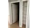 Hallway featuring storage and neutral flooring at 5610 Forest Ridge Dr, Winter Haven, FL 33881