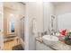 Clean bathroom with updated vanity and walk-in shower at 6001 Caymus Loop, Windermere, FL 34786