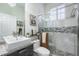 Modern bathroom with a large walk-in shower and updated fixtures at 6001 Caymus Loop, Windermere, FL 34786