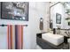 Modern bathroom with patterned tile and floating vanity at 6001 Caymus Loop, Windermere, FL 34786