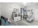 Bright bedroom with built-in shelving and workspace at 6001 Caymus Loop, Windermere, FL 34786