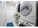 Convenient laundry room with washer, dryer, and storage at 6001 Caymus Loop, Windermere, FL 34786