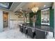 Outdoor kitchen with a large granite countertop island and built-in grill at 6001 Caymus Loop, Windermere, FL 34786