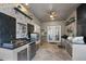 Outdoor kitchen with stainless steel appliances and tile backsplash at 6001 Caymus Loop, Windermere, FL 34786