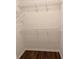 Walk-in closet with wire shelving; offers ample storage space at 6088 Westgate Dr # 103, Orlando, FL 32835