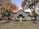Building exterior showcasing landscaping and entrance at 6088 Westgate Dr # 103, Orlando, FL 32835