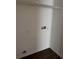 Laundry closet with hookups and wood flooring at 6088 Westgate Dr # 103, Orlando, FL 32835
