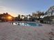 Inviting community pool with lounge chairs at 6088 Westgate Dr # 103, Orlando, FL 32835