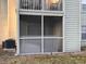 Ground level screened-in porch with lattice detail at 6088 Westgate Dr # 103, Orlando, FL 32835
