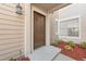 A front door view shows a well-lit entrance with maintained landscaping and a small porch at 686 Roaring Dr # 343, Altamonte Springs, FL 32714