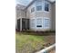 Charming two-story home with a screened porch, balcony and manicured flower beds at 686 Roaring Dr # 343, Altamonte Springs, FL 32714