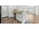 Functional kitchen with granite countertops, stainless steel dishwasher, and an open view to the living area at 686 Roaring Dr # 343, Altamonte Springs, FL 32714