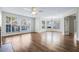 Spacious living room has wood flooring, ceiling fan and lots of natural light at 686 Roaring Dr # 343, Altamonte Springs, FL 32714