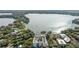 An aerial view showcases lakefront property at 690 Osceola Ave # 604, Winter Park, FL 32789