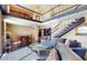 A stylish living room with vaulted ceilings, dark floors, and an open concept floor plan at 690 Osceola Ave # 604, Winter Park, FL 32789
