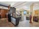 An open floor plan with a kitchen, living room and dining area with a lake view at 690 Osceola Ave # 604, Winter Park, FL 32789