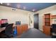 Office space offering built-in cabinets, multiple desks, and a large open door area at 690 Osceola Ave # 604, Winter Park, FL 32789