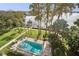 Beautiful condo pool with lakeside access to the boat dock in a gated community at 690 Osceola Ave # 604, Winter Park, FL 32789
