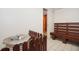 Inviting sauna area with a wooden bench and rocks, offering a tranquil space for relaxation at 690 Osceola Ave # 604, Winter Park, FL 32789