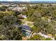 Aerial view showcasing home, pool, and surrounding landscape at 718 32Nd St, Orlando, FL 32806