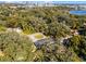 Aerial view of house nestled in a lush, wooded area at 718 32Nd St, Orlando, FL 32806