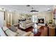 Living room featuring hardwood floors, fireplace, and a comfortable seating area at 718 32Nd St, Orlando, FL 32806