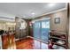 Home office with hardwood floors, large window, and built-in shelving at 718 32Nd St, Orlando, FL 32806