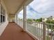 Private balcony offering scenic views of the surrounding community at 7521 Mourning Dove Cir # 303, Reunion, FL 34747