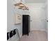 Walk-in closet with ample shelving and a built-in safe at 7521 Mourning Dove Cir # 303, Reunion, FL 34747
