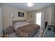 Stylish bedroom with neutral tones, and a cozy ambiance for a peaceful retreat at 1001 Willow Run St., Minneola, FL 34715