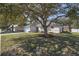 Charming single-story home featuring a two-car garage and a well-maintained lawn at 1001 Willow Run St., Minneola, FL 34715