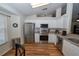 Updated kitchen featuring stainless steel appliances, spacious countertops, and light cabinetry at 1001 Willow Run St., Minneola, FL 34715