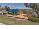 Community playground featuring a covered play area and swing sets at 1001 Willow Run St., Minneola, FL 34715