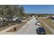 Quiet neighborhood street with mature trees and well-kept homes at 1001 Willow Run St., Minneola, FL 34715