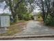 Yellow house with driveway and mailboxes at 1040 Maxey Dr, Winter Garden, FL 34787