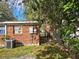 Brick house exterior with AC unit and electrical box at 1040 Maxey Dr, Winter Garden, FL 34787