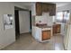 Small kitchen with wood cabinets and a countertop at 1040 Maxey Dr, Winter Garden, FL 34787
