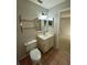Bathroom with toilet and vanity at 115 Cardamon Dr, Orlando, FL 32825