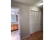 Clean bathroom with a wooden vanity and a view into another room at 115 Cardamon Dr, Orlando, FL 32825