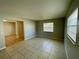 Living area with tile flooring and neutral wall colors at 115 Cardamon Dr, Orlando, FL 32825