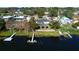 Lakefront property with private dock and lush landscaping at 115 N Lake Florence Dr, Winter Haven, FL 33884