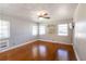 Spacious bedroom with hardwood floors and large windows at 115 N Lake Florence Dr, Winter Haven, FL 33884