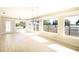 Bright dining room with hardwood floors and water views at 115 N Lake Florence Dr, Winter Haven, FL 33884