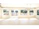 Bright dining room with large windows and lake views at 115 N Lake Florence Dr, Winter Haven, FL 33884