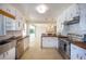 Updated kitchen with butcher block countertops at 115 N Lake Florence Dr, Winter Haven, FL 33884