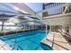 Relaxing screened pool and patio area at 115 N Lake Florence Dr, Winter Haven, FL 33884