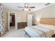 Bedroom with walk-in closet and window at 12666 Moss Park Ridge Dr, Orlando, FL 32832