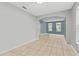 Bright dining room with tile floors and an arched pass-through at 12666 Moss Park Ridge Dr, Orlando, FL 32832