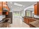 Spacious kitchen with granite countertops and stainless steel appliances at 12666 Moss Park Ridge Dr, Orlando, FL 32832