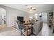 Comfortable living room with sectional sofa, and access to the backyard at 12666 Moss Park Ridge Dr, Orlando, FL 32832